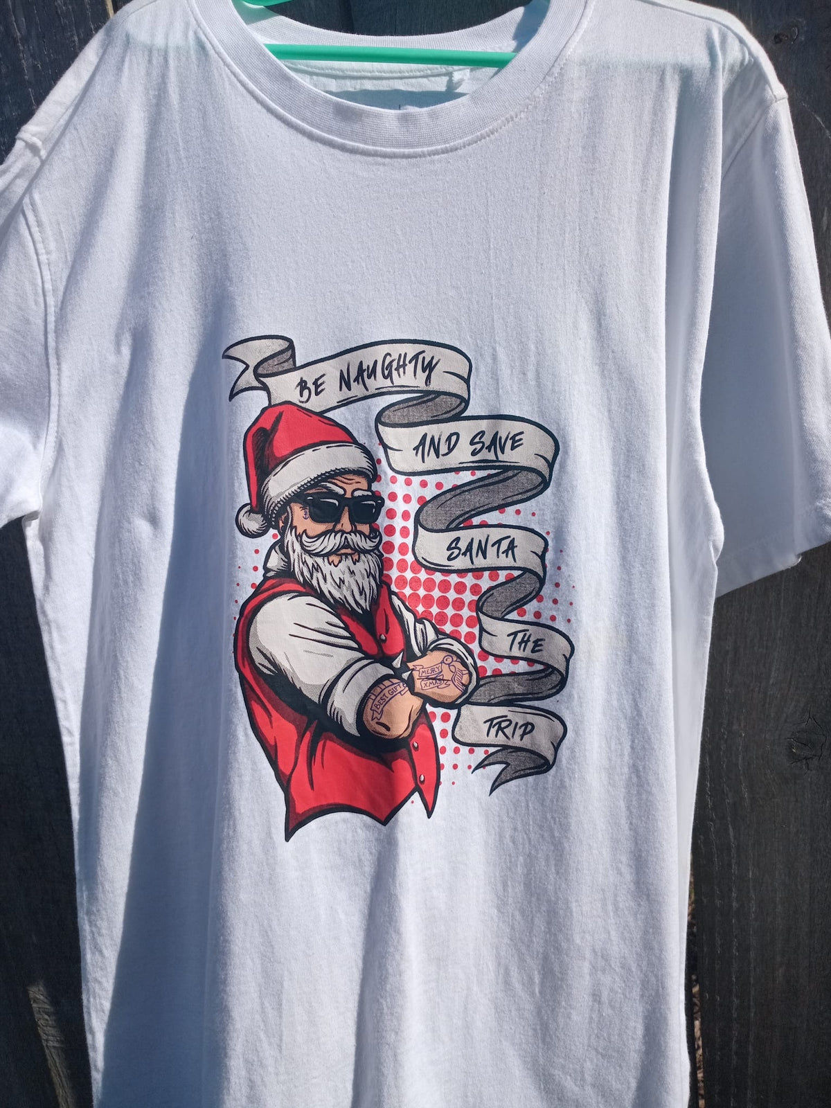 T-Shirt - Be Naughty And Save Santa The Trip